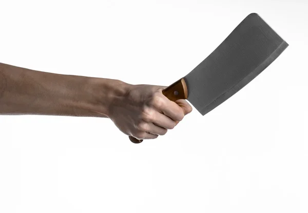 Mano sosteniendo un cuchillo para carne, cuchilla, chef sosteniendo un cuchillo, un cuchillo grande, cuchillo de cocina, tema de la cocina, fondo blanco, aislado, cuchillo de carnicero — Foto de Stock