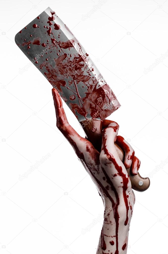 Bloody Halloween theme: bloody hand holding a large bloody kitchen knife on a white background isolated