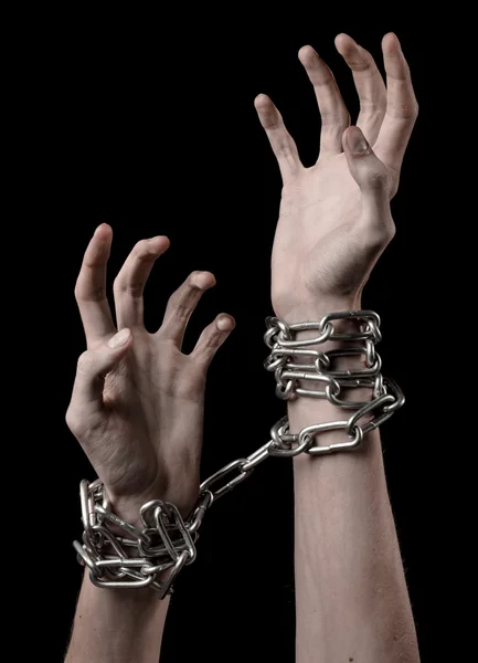 Hands tied chain, kidnapping, dependence, loneliness, social problem, halloween theme, killer, crazy, freedom black background — Stock Photo, Image