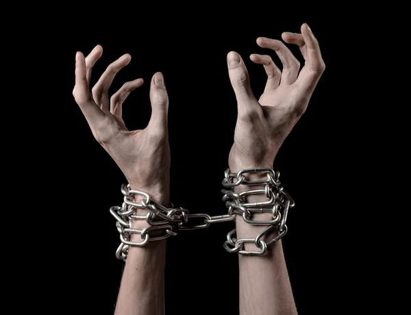 Hands tied chain, kidnapping, dependence, loneliness, social problem, halloween theme, killer, crazy, freedom black background — Stock Photo, Image