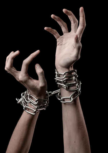 Hands tied chain, kidnapping, dependence, loneliness, social problem, halloween theme, killer, crazy, freedom black background — Stock Photo, Image