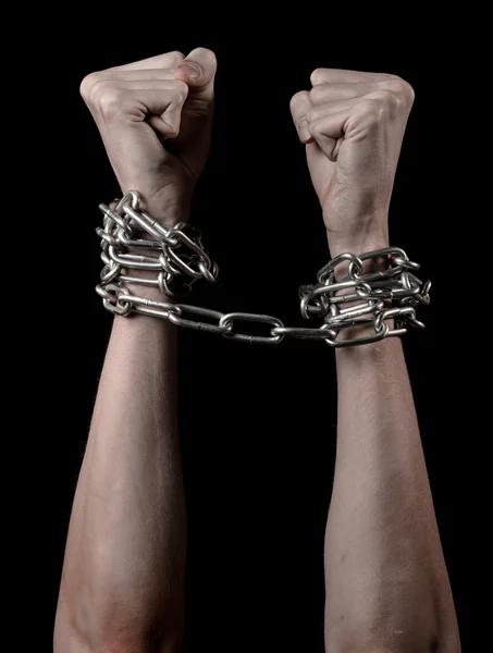 Hands tied chain, kidnapping, dependence, loneliness, social problem, halloween theme, killer, crazy, freedom black background — Stock Photo, Image