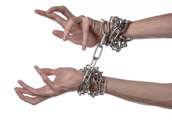 Social theme: hands tied a metal chain on a white background — Stock Photo, Image