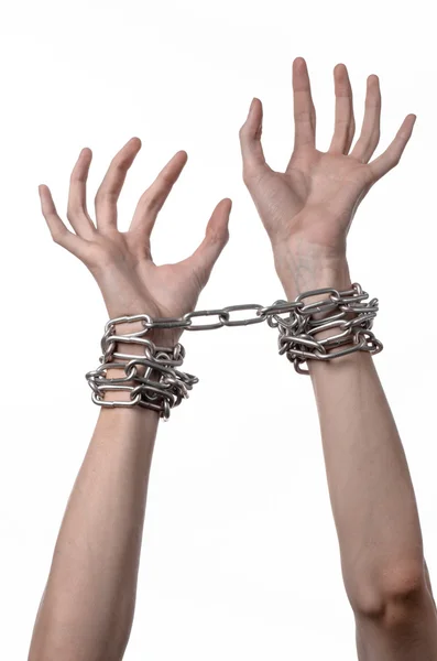 Social theme: hands tied a metal chain on a white background — Stock Photo, Image