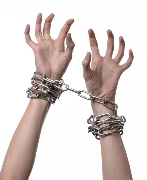 Social theme: hands tied a metal chain on a white background — Stock Photo, Image