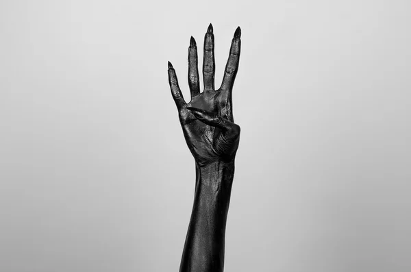 Black hand of death — Stock Photo, Image