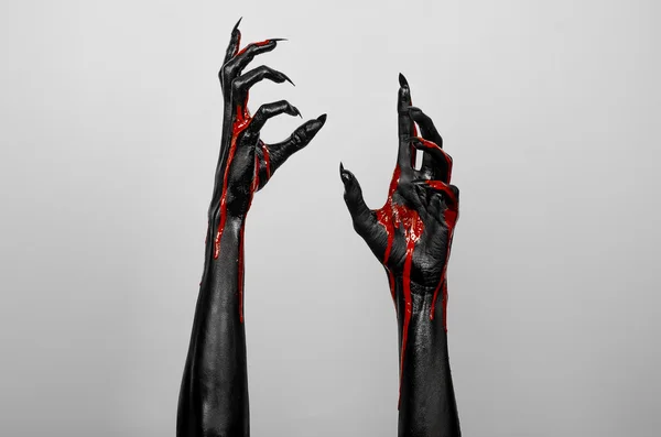 Bloody black hands of death — Stock Photo, Image