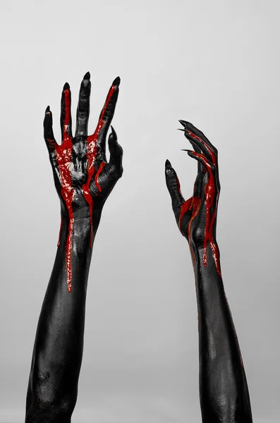 Blodiga svarta händer av död — Stockfoto