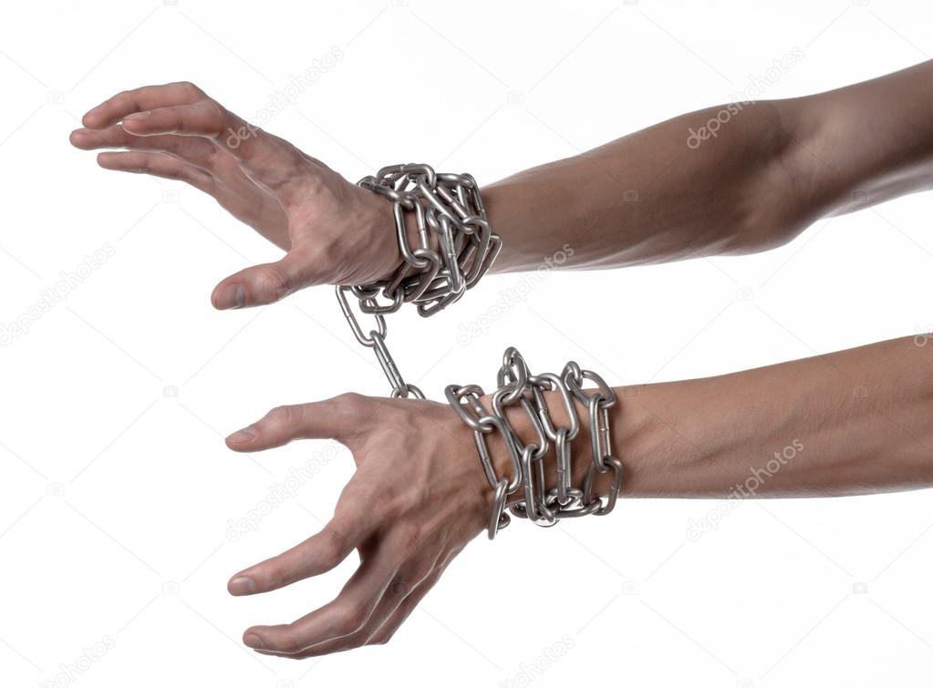 Social theme: hands tied a metal chain on a white background