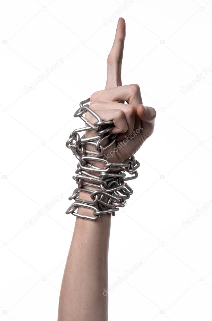 Social theme: hands tied a metal chain on a white background