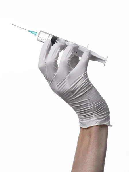 Χέρι του γιατρού που κρατά μια σύριγγα, λευκό-γάντια χέρι, μεγάλη σύριγγα, ιατρικό ζήτημα, ο γιατρός κάνει μια ένεση, άσπρο φόντο, απομονωμένη, λευκό γιατρός γάντια — Φωτογραφία Αρχείου