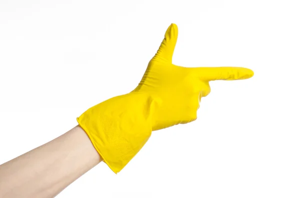 Házi, mosó- és tisztítószerek, a téma: férfi kezében egy sárga visel, és gumi kesztyűt tisztítására, elszigetelt fehér background stúdió — Stock Fotó