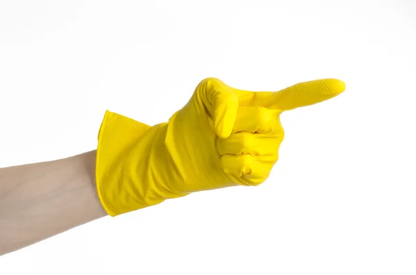 Trabalho de casa, lavagem e limpeza do tema: mão do homem segurando um amarelo e usa luvas de borracha para limpeza isolada em fundo branco no estúdio — Fotografia de Stock