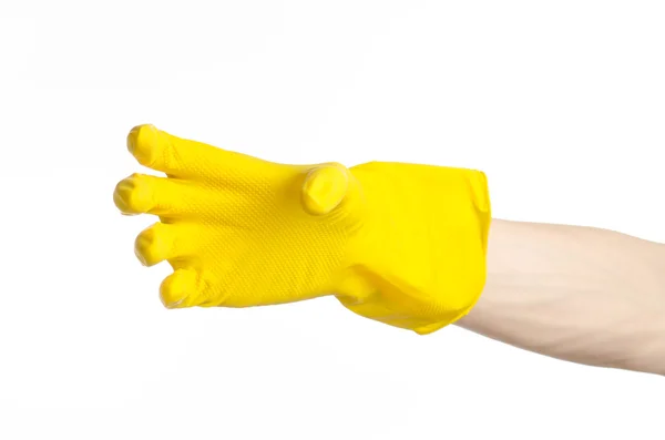 Tareas, lavado y limpieza del tema: la mano del hombre sostiene un amarillo y usa guantes de goma para limpiar aislado sobre fondo blanco en el estudio — Foto de Stock