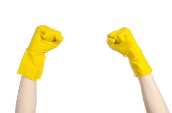 Homework, washing and cleaning of the theme: man's hand holding a yellow and wears rubber gloves for cleaning isolated on white background in studio — Stock Photo, Image