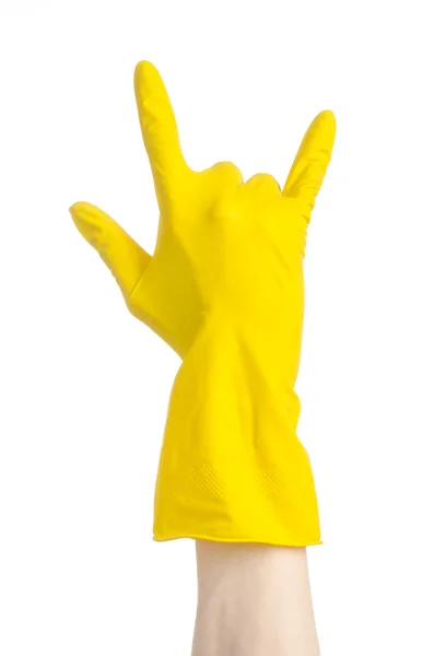 Homework, washing and cleaning of the theme: man's hand holding a yellow and wears rubber gloves for cleaning isolated on white background in studio — Stock Photo, Image