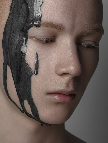 Portrait of a man with gray paint on the face — Stock Photo, Image