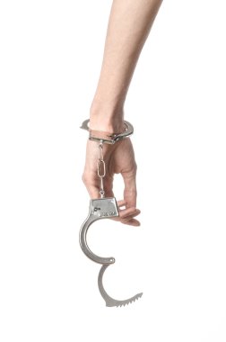 Prison and convicted topic: man hands with handcuffs isolated on clipart