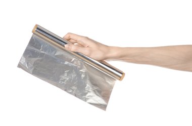 Pişirme ve shisha Konu: insan eli üzerinde izole bir folyo holding 