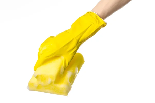 Cleaning the house and sanitation topic: Hand holding a yellow s — Stock Photo, Image