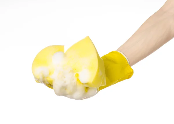 Cleaning the house and sanitation topic: Hand holding a yellow s — Stock Photo, Image