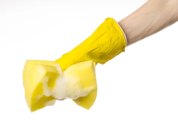 Cleaning the house and sanitation topic: Hand holding a yellow s — Stock Photo, Image