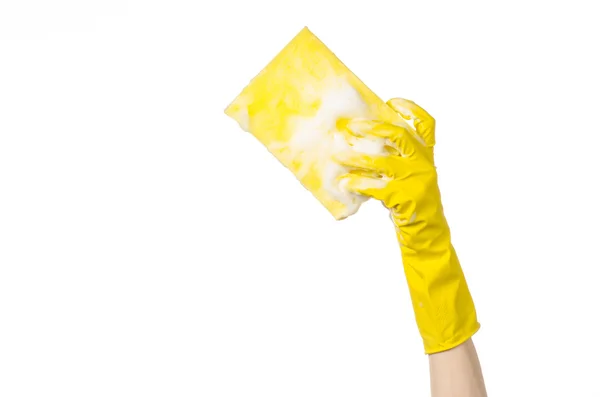 Cleaning the house and sanitation topic: Hand holding a yellow s — Stock Photo, Image