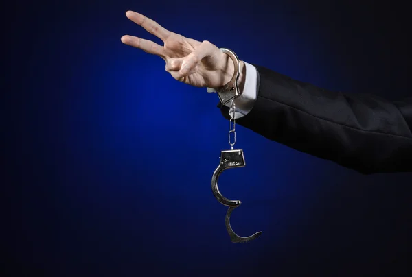 Corruption and bribery theme: businessman in a black suit with h — Stock Photo, Image