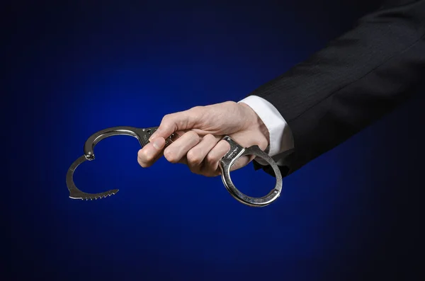 Corruption and bribery theme: businessman in a black suit with h — Stock Photo, Image