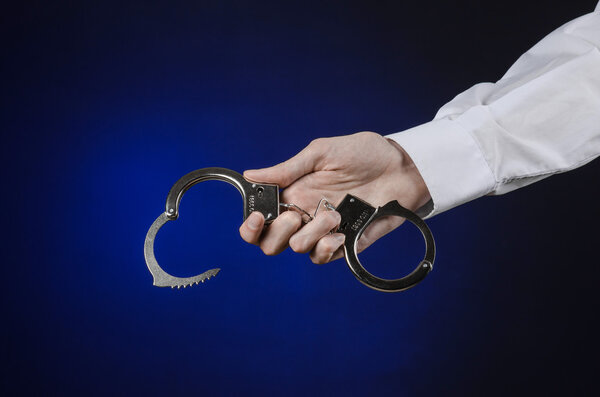 Dishonest and a prison doctor topic: the hand of man in a white 