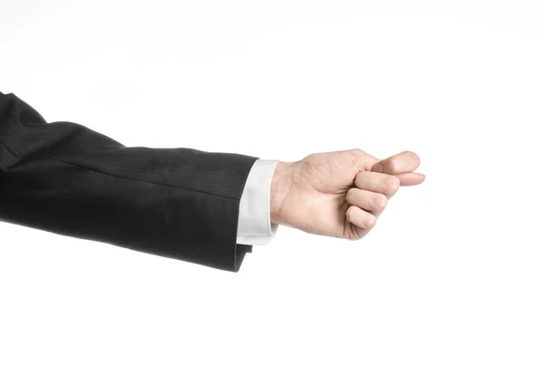 Uomo d'affari e tema del gesto: un uomo in abito nero e camicia bianca che mostra il gesto della mano su uno sfondo bianco isolato in studio — Foto Stock