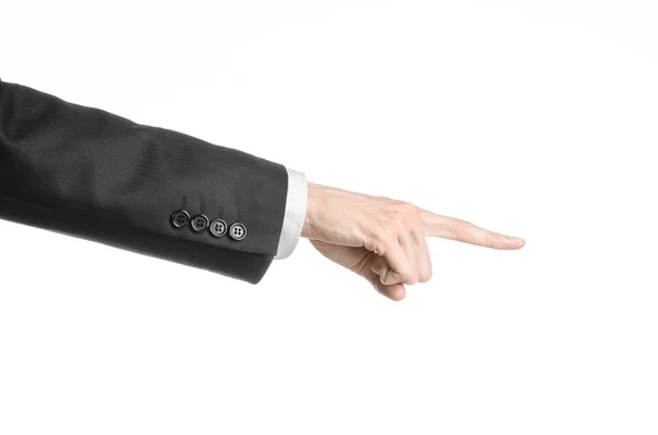 Businessman and gesture topic: a man in a black suit and white shirt showing hand gesture on an isolated white background in studio — Stock Photo, Image