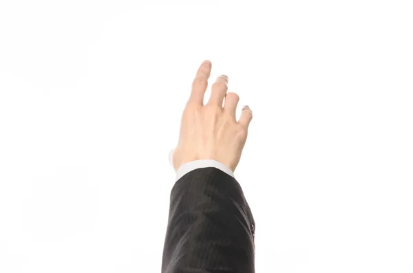 Gestures and Business theme: businessman shows hand gestures with a first-person in a black suit on a white background isolated — Stock Photo, Image