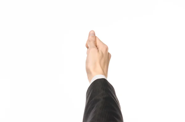 Gestures and Business theme: businessman shows hand gestures with a first-person in a black suit on a white background isolated — Stock Photo, Image