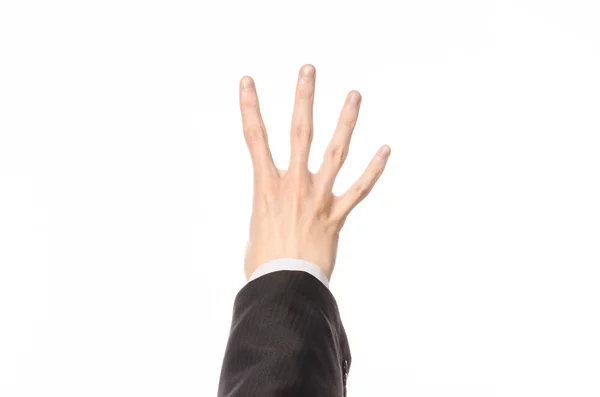 Gestures and Business theme: businessman shows hand gestures with a first-person in a black suit on a white background isolated — Stock Photo, Image