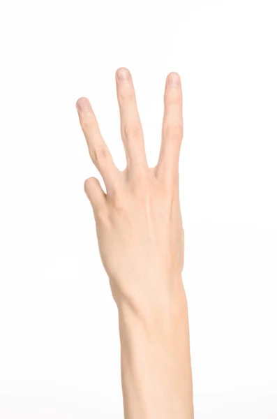 Hand gebaren thema: de menselijke hand toont gebaren geïsoleerd op een witte achtergrond in de studio — Stockfoto