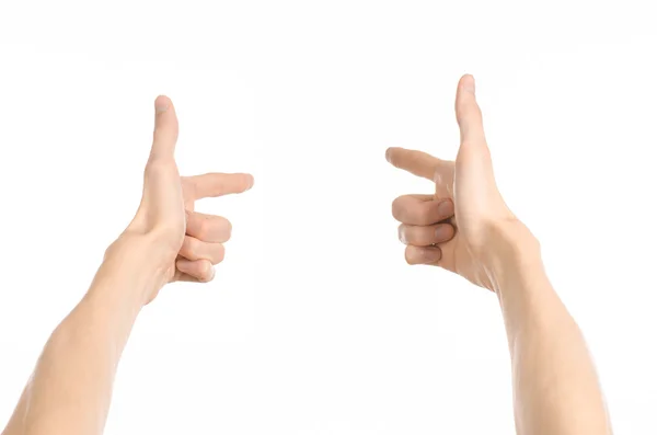 Тема жестов: жесты от человека, показывающие вид от первого лица на белом фоне в студии — стоковое фото