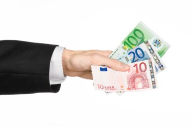 Para ve iş Konu: holding banknot 10,20 ve 100 euro Studio beyaz izole arka plan üzerinde siyah bir takım elbise el