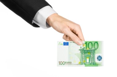 Para ve iş Konu: 100 euro Studio beyaz bir arka plan üzerinde izole bir banknot elinde siyah bir takım elbise el