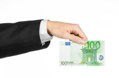Para ve iş Konu: 100 euro Studio beyaz bir arka plan üzerinde izole bir banknot elinde siyah bir takım elbise el