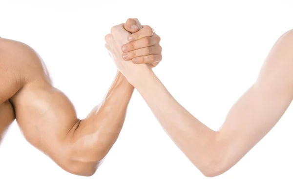 Bodybuilding & Fitness Topic: arm wrestling thin hand and a big strong arm isolated on white background in studio — Stock Fotó