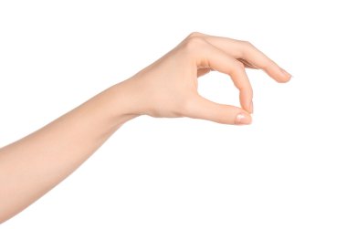 Beauty and Health theme: beautiful elegant female hand show gesture on an isolated white background in studio