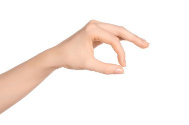 Beauty and Health theme: beautiful elegant female hand show gesture on an isolated white background in studio