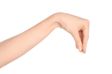 Beauty and Health theme: beautiful elegant female hand show gesture on an isolated white background in studio