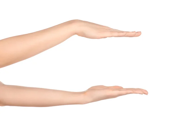 Beauty and Health theme: beautiful elegant female hand show gesture on an isolated white background in studio — Stockfoto