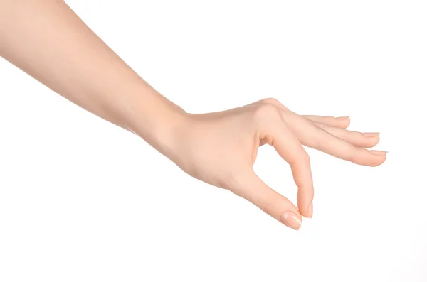 Beauty and Health theme: beautiful elegant female hand show gesture on an isolated white background in studio — Zdjęcie stockowe