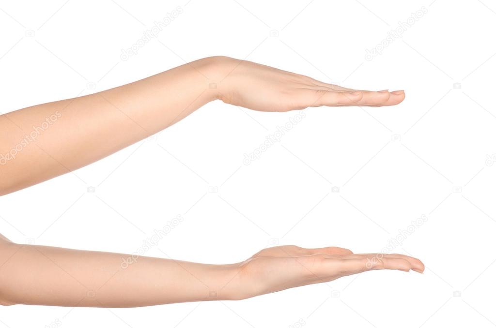 Beauty and Health theme: beautiful elegant female hand show gesture on an isolated white background in studio