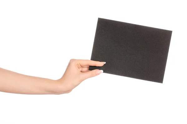 Branding és a hirdetési téma: gyönyörű nő kezében üres fekete papír kártya elszigetelt fehér background — Stock Fotó