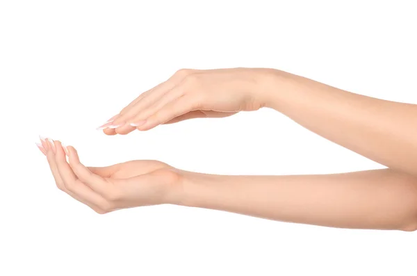 Salud y cuidado corporal tema: hermosa mano femenina con crema blanca aislada sobre un fondo blanco, masaje de manos — Foto de Stock