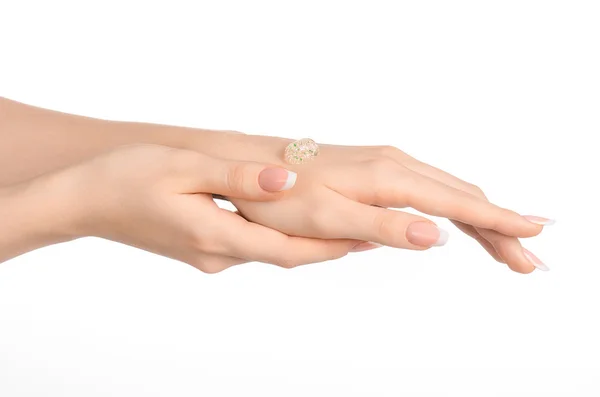 Health and body care theme: beautiful female hand with a transparent scrub cream on a white background isolated — Stock fotografie